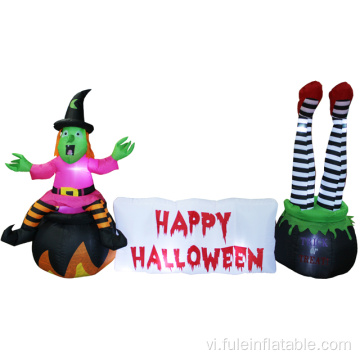 Phù thủy bơm hơi Halloween với đồ trang trí cảnh Halloween